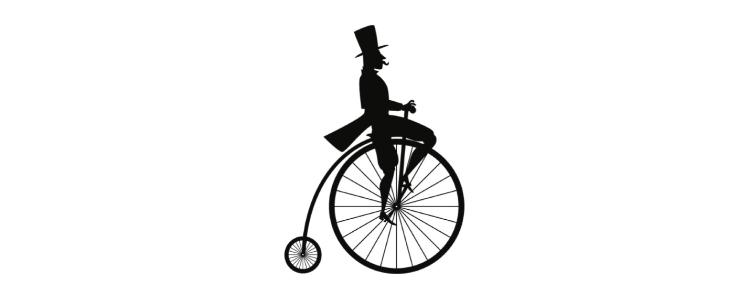 Silouette of man in top hat on old fashioned bicycle