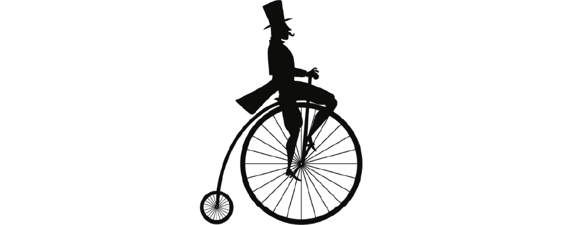 Une silhouette d’un homme portant un chapeau haut de forme sur une ancienne bicyclette